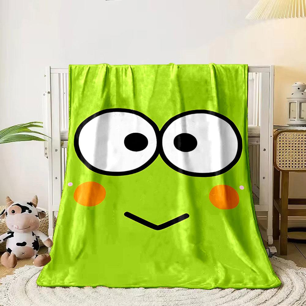 

A green cartoon frog face with big eyes, orange cheeks, and a simple mouth. for all seasons blanket lunch break throw gift 80cm x 120cm