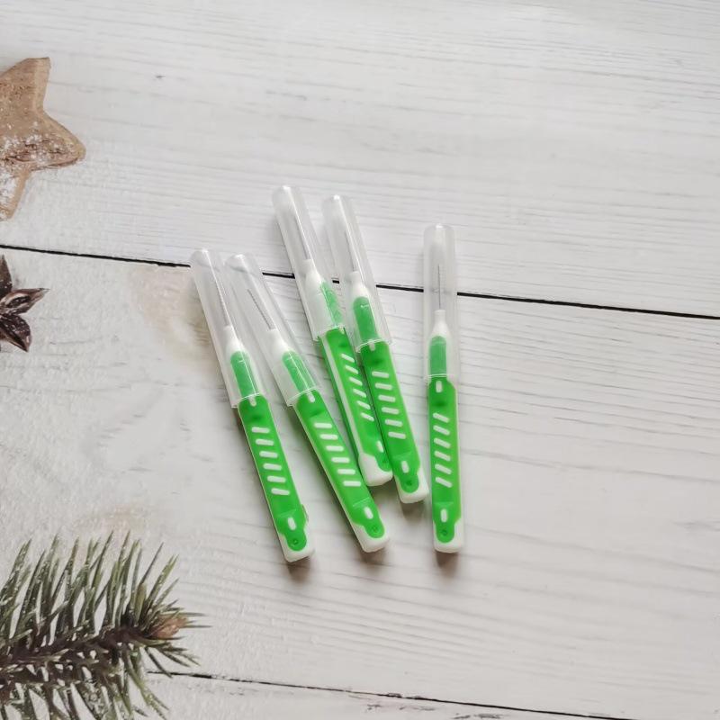 Dual-Color Orthodontic Interdental Brush for Gap and Bracket Cleaning