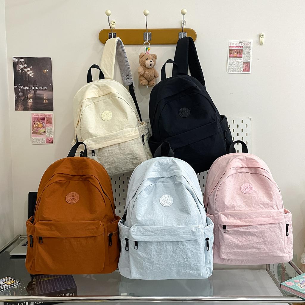 Mountaineering trip new Korean version schoolbag student backpack high school student junior high school student solid color simple backpack