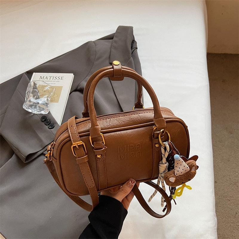 Niche retro portable pillow bag women's handbag 2025 autumn new fashionable high-value shoulder messenger bag