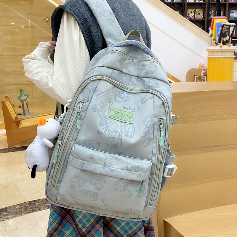 School bag for female junior high school students, simple and versatile printed bear niche design, college student computer backpack tide