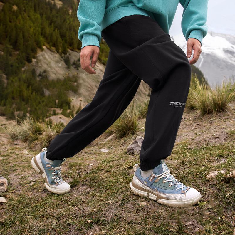 Li Ning CF Adventure Series Bold Fun Wild Letter Print Cuffed Loose Fleece Knit Sports Pants Men Pants Black AKLTA99-1