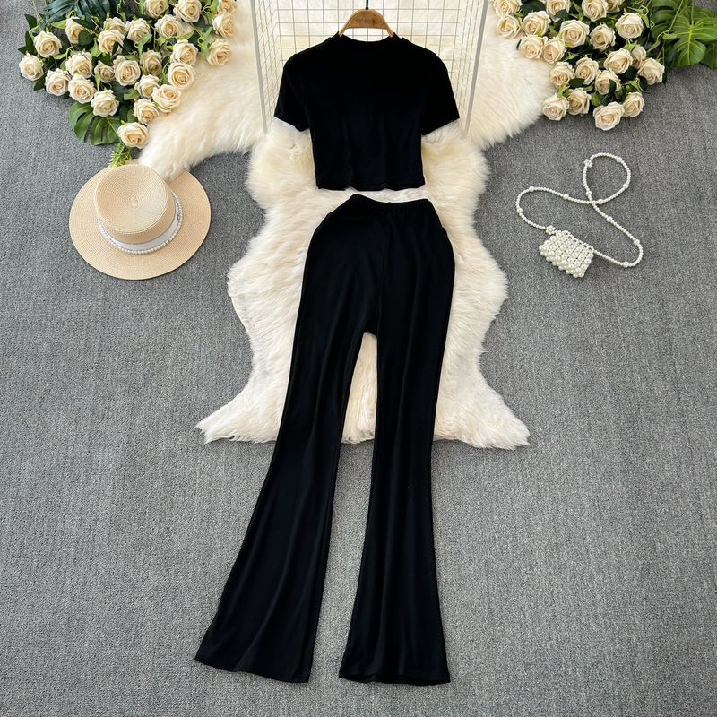 

Midriff-Baring Top High Waist Slim Looking Slightly Flared Fashion Suit Black One size