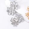Simple, fashionable, light luxury, retro alloy exaggerated flower earrings, versatile, casual and daily wear women's earrings