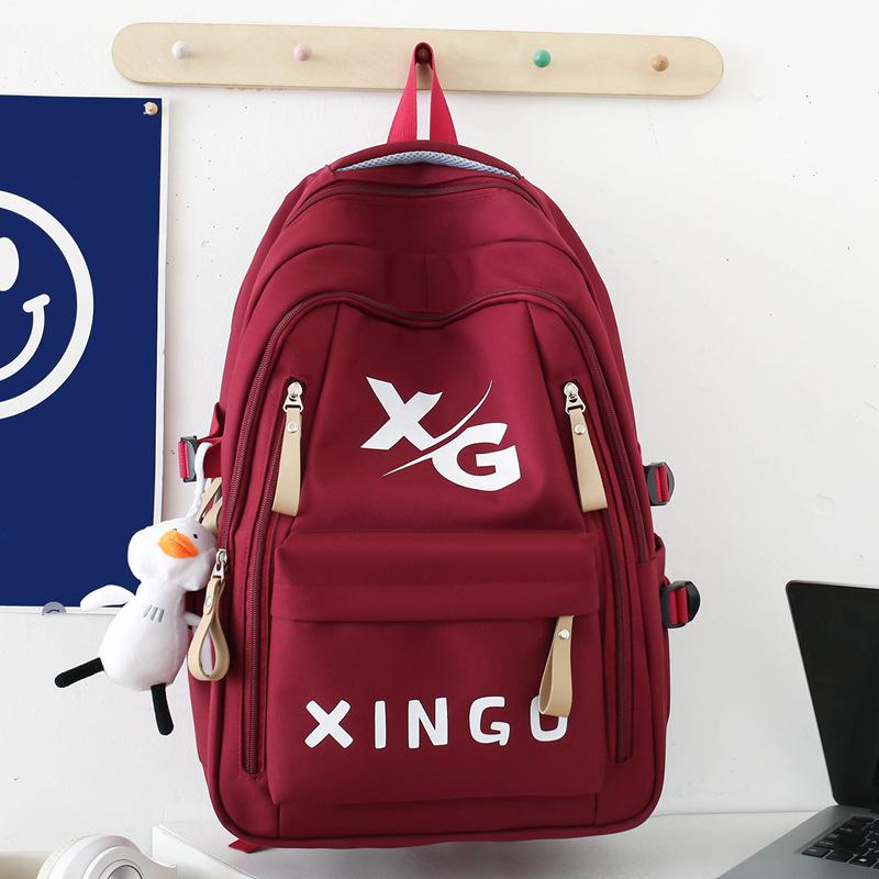 Schoolbag1011 new large-capacity backpack to reduce the burden of small, medium and early college students schoolbags, street trend travel bags,