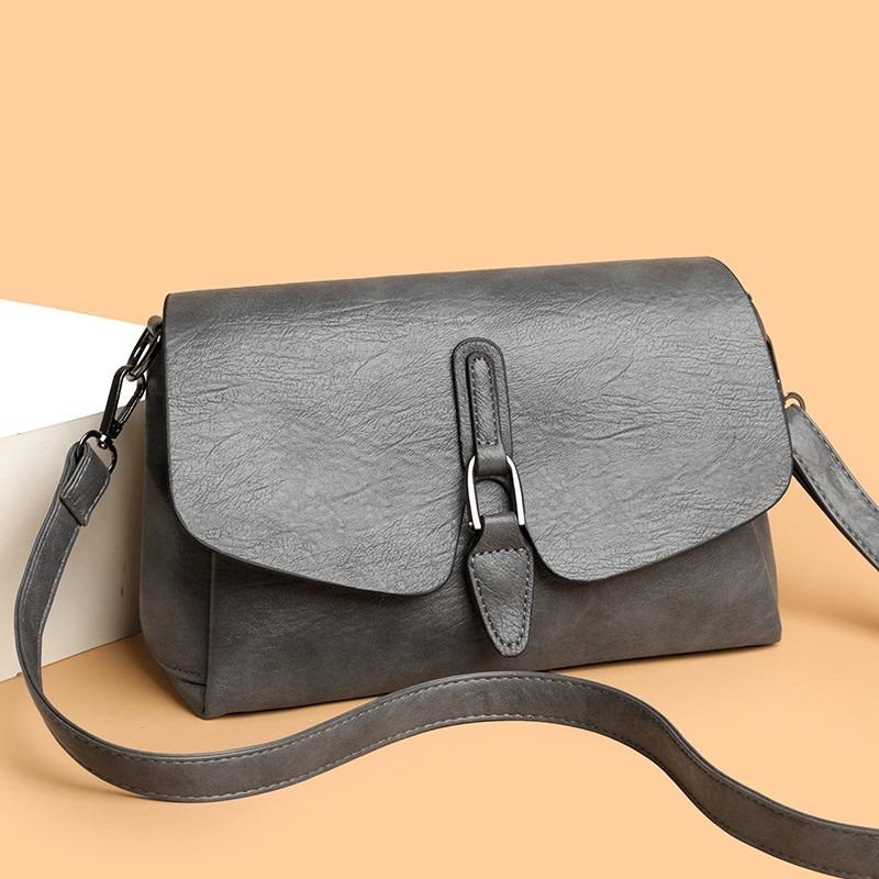 Damen Umhängetasche mit Klappe aus strukturiertem Leder Lässige Schultertasche