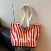 Niche design fashionable striped tote bag women's new large-capacity lazy wind shoulder bag canvas bag