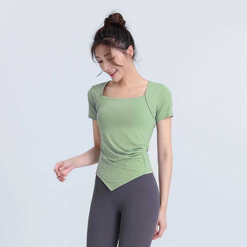 

Женский синий укороченный топ для йоги с короткими рукавами, квадратным вырезом, асимметричным подолом и сборками на талии S зелёный