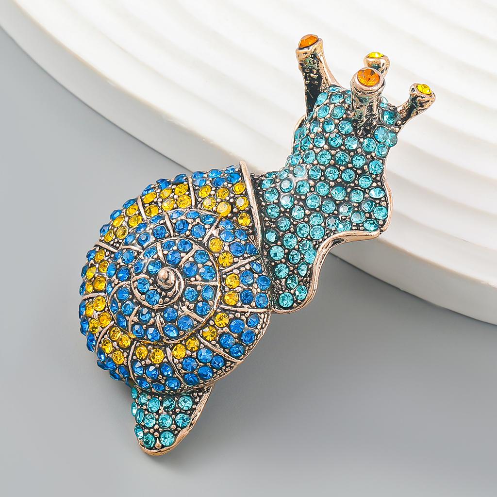 SKEDS Women Men Fashion Luxury Full Crystal Snail Brooches Jewelry Exquisite Shiny Boutique Creative Pins Buckle For Lady Party