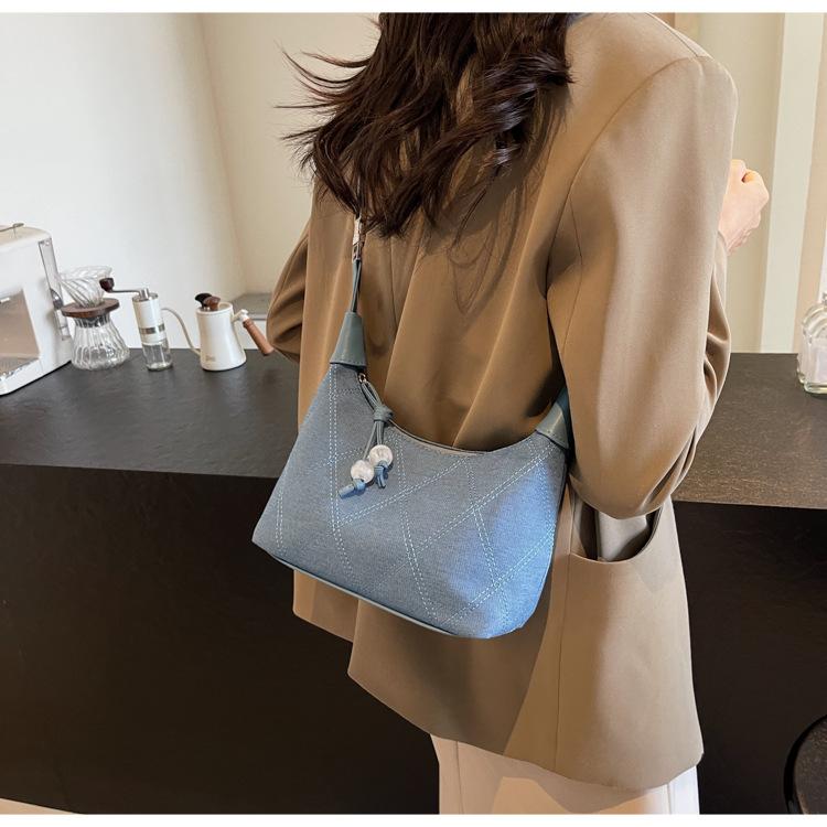

Denim bag women s summer 2025 new fashion handheld cloth bag high sense women s messenger work small bag светло-синий