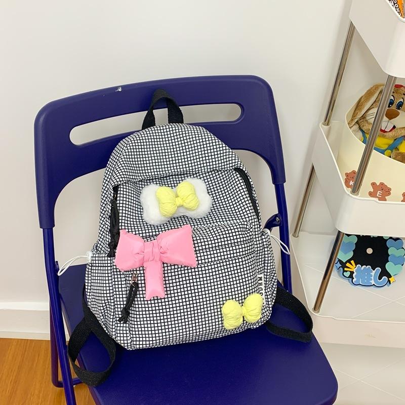 Schoolbag Japanese ins new middle school student schoolbag for women, high value, fresh and full of stars, junior high school students lightweight