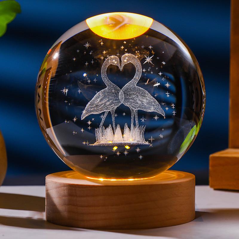 Flickering Crystal Ball Night Light with Engraved Solid Wood Base - Perfect as a Birthday Gift or Creative Graduation Ornament.