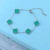 Bracciale da donna a fascia con conchiglia double-face e quadrifoglio, resistente ai colori, alla moda e di alta gamma