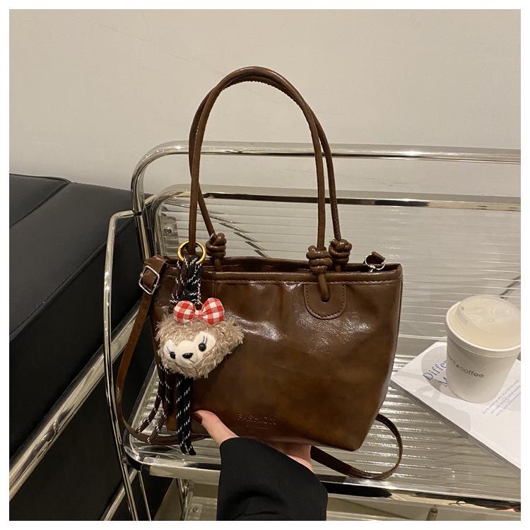 

Женская ретро сумка-корзина через плечо 2024 года - Универсальная и модная Without Pendant темно-коричневого