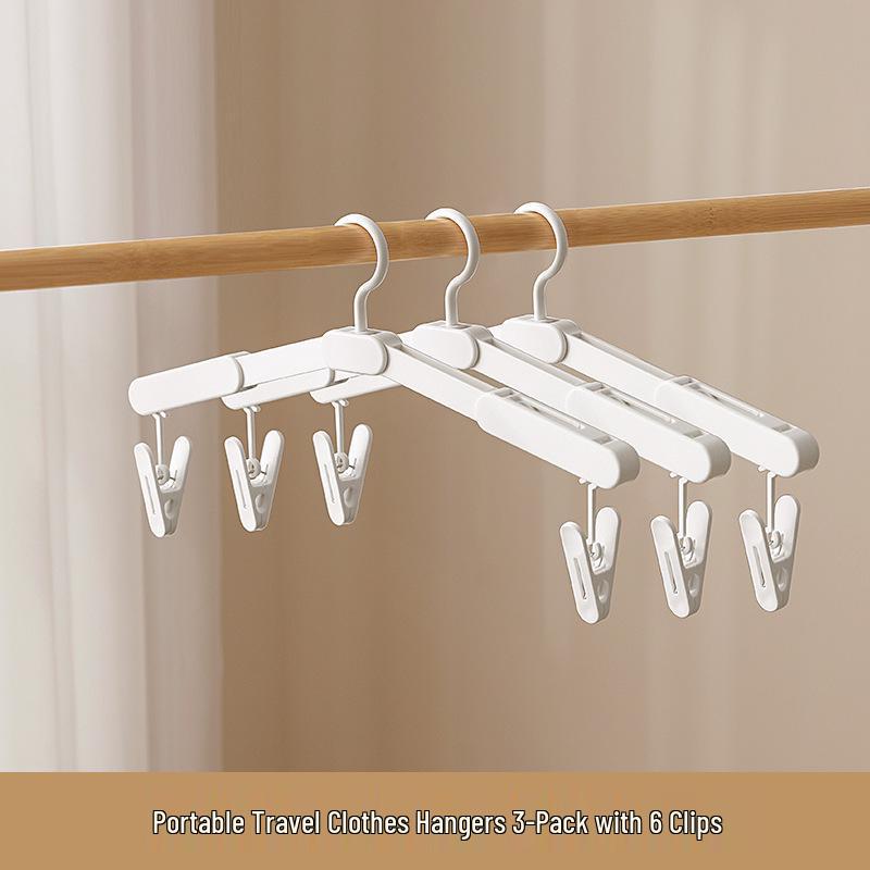 Portable Folding Travel Clothes Rack - Telescopic No-Punch Hanger for Indoor Drying