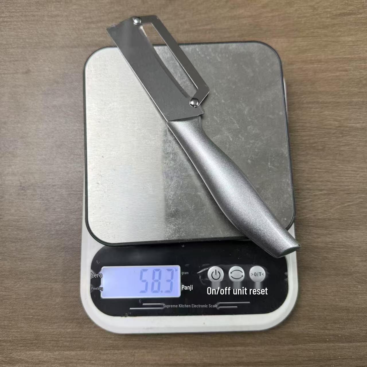 

Многофункциональная овощечистка из нержавеющей стали: Дыня, Сахарный тростник, Ананас - Кухонный инструмент 2-в-1 из нержавеющей стали.