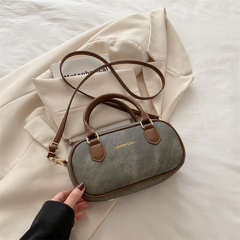 

Ручная ретро сумка для боулинга женская 2025 лето новая мода повседневная сумка через плечо нишевая высокая ценность сумка-мессенджер чёрный