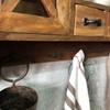 Rustic wooden wall cabinet with drawers and hooks