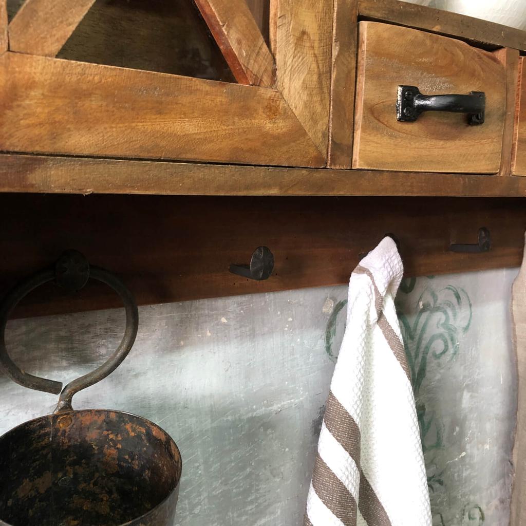 Rustic wooden wall cabinet with drawers and hooks