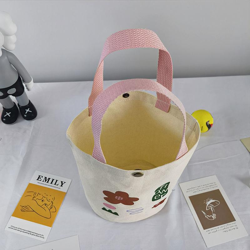 Damenhandtasche aus Canvas mit Nischendesign und Aufdruck, zum Mitnehmen von Lunchboxen, Bento-Stoffbeutel, einfache, vielseitige Einkaufstasche im literarischen Eimer-Stil