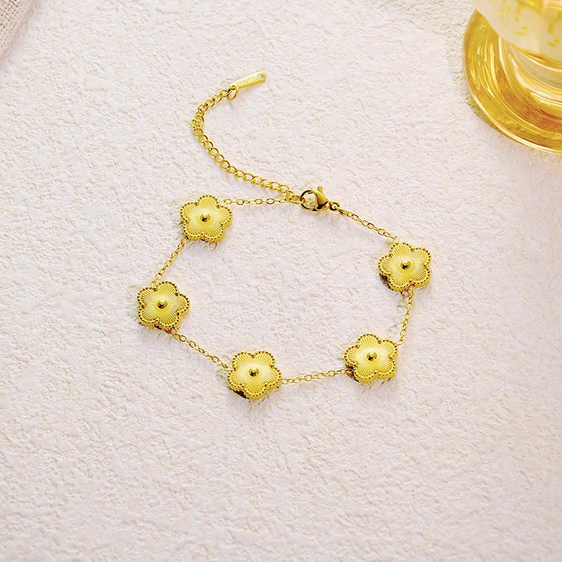 Titanium Steel Clover Bracelet with Mother-of-Pearl Double-Sided Design - Elegant and Versatile Fashion Jewelry.