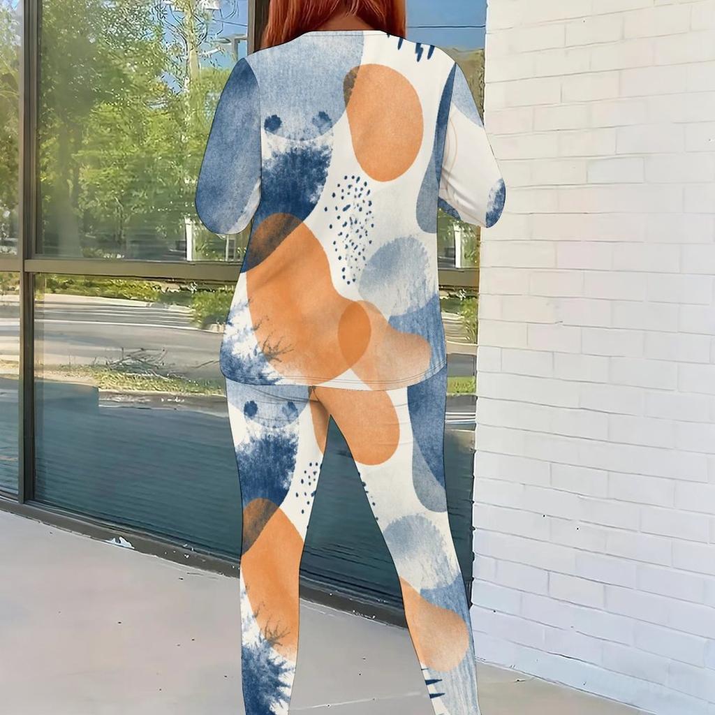 Women Plus Size White Printed Round Neck Long Sleeve Top And Fitted Pants Two Piece Set