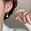 Metal Wind Love Ear Clips, Exquisite Earrings, Women's Niche Design Sense, Simple Personality, Mosquito Coil Disc, Women Without Ear Piercings