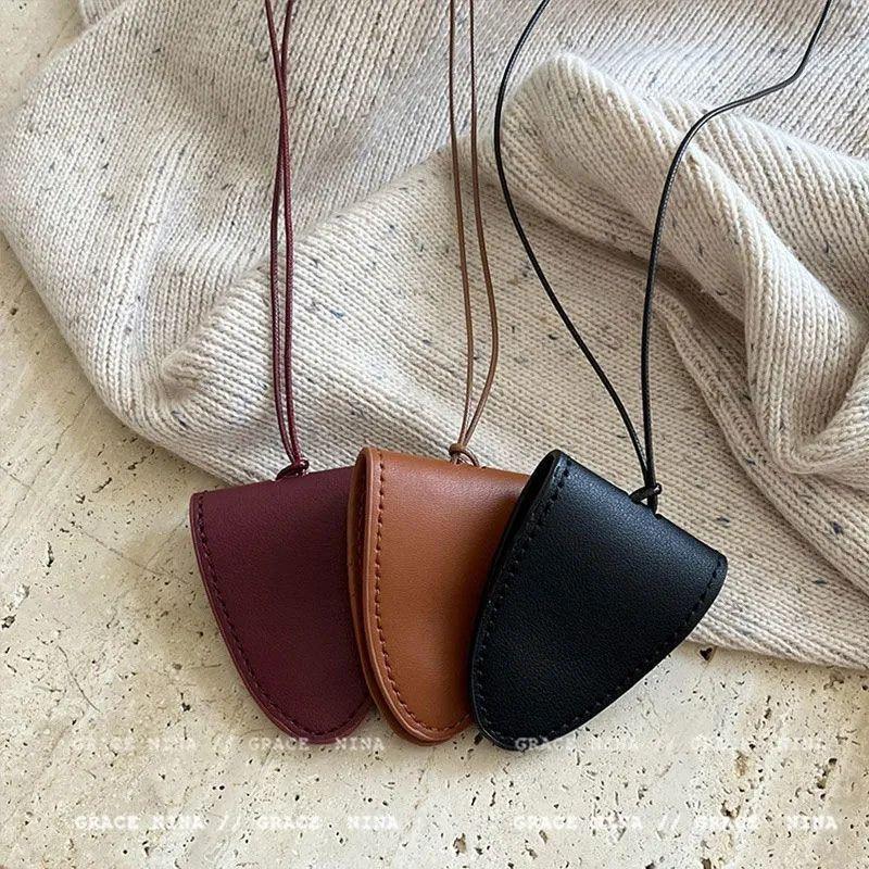 Neck magnetic leather glasses bag Neck card bag Unisex portable long chain key bag Sunglasses storage bag