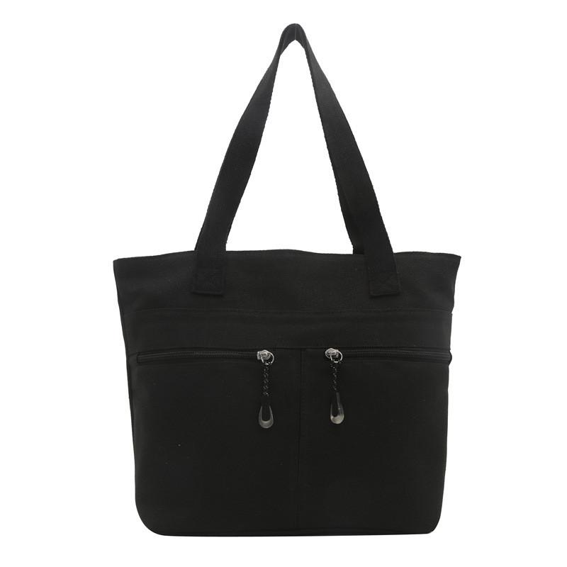 Spacious And Stylish Black Canvas Tote Bag For Women Perfect For Casual Everyday Use