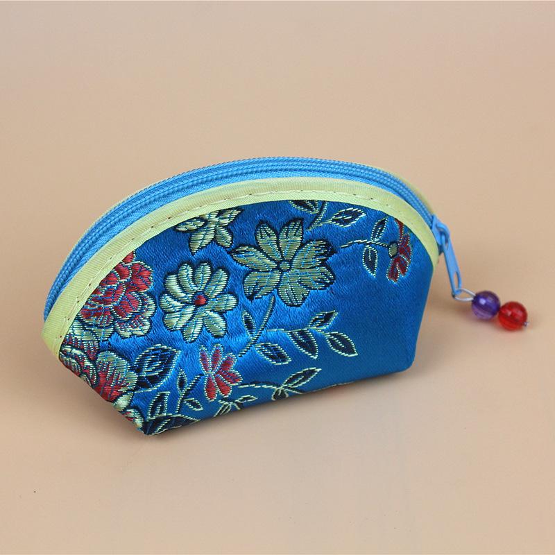 

Класичний китайський гаманець для монет Юаньбао з квітковим візерунком на блискавці 12x8x5 cm небо синє кольору