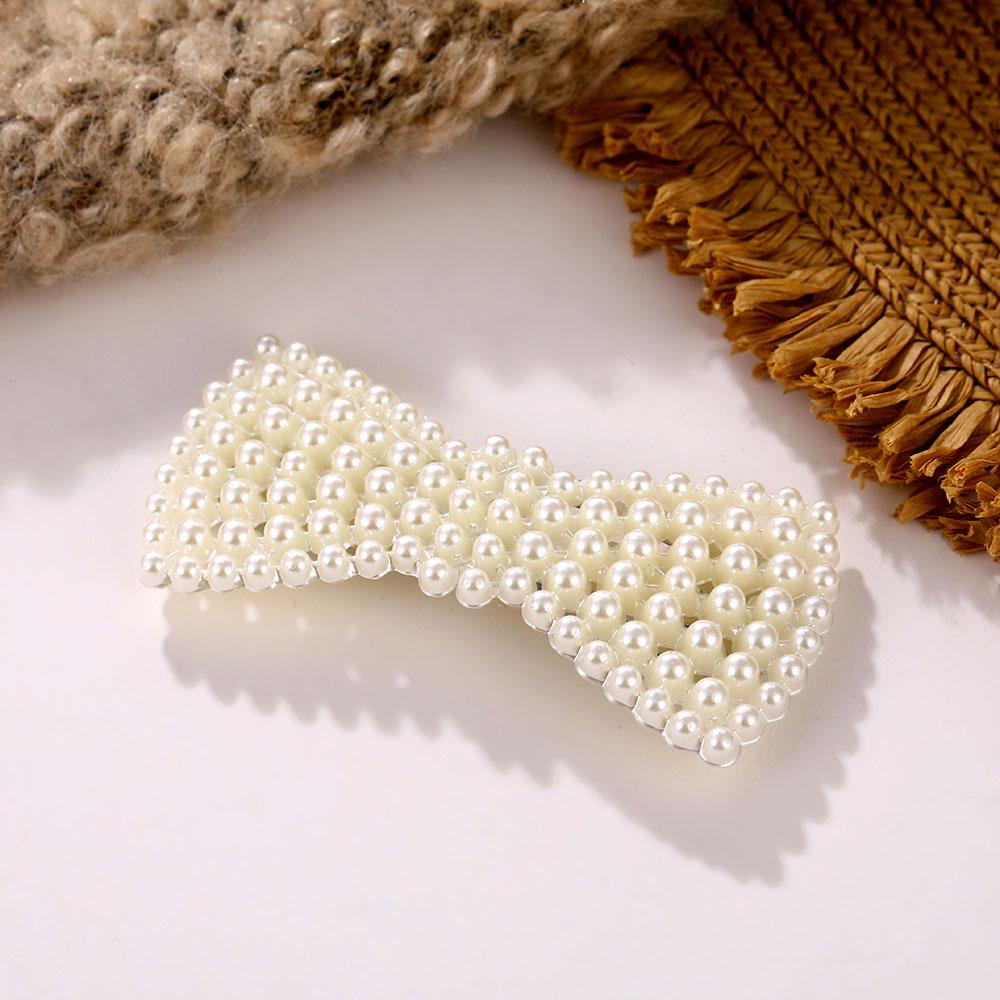 

Набор из 12 заколок для волос с жемчужными бусинами 8