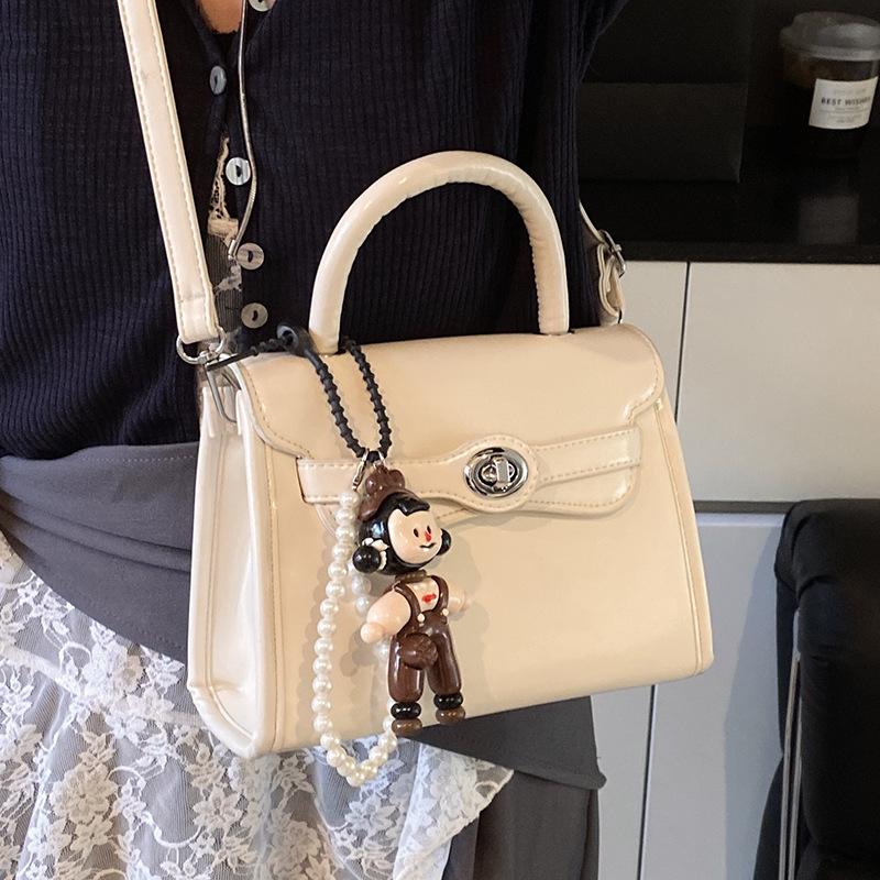 Fashion New French Simple Style High-end Sense Portable Small Square Bag Casual Versatile Commuter Solid Color PU Messenger Bag Women