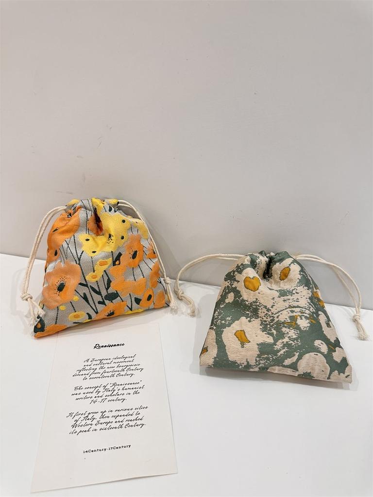 Stylish Floral Drawstring Storage Bag In Gentle Green And Orange Color Combinations For Travel And Organizing Essentials
