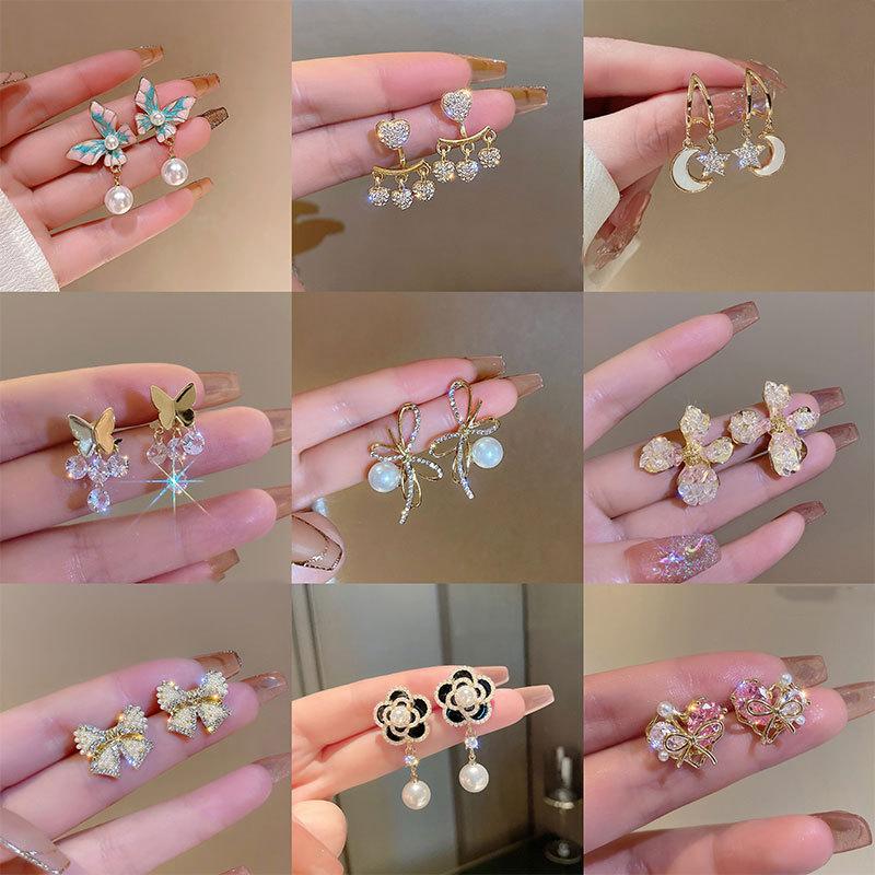 Fashion Geometric Bow Flower Pearl Earrings Women'S Premium Versatile Small Fragrant Wind Earrings