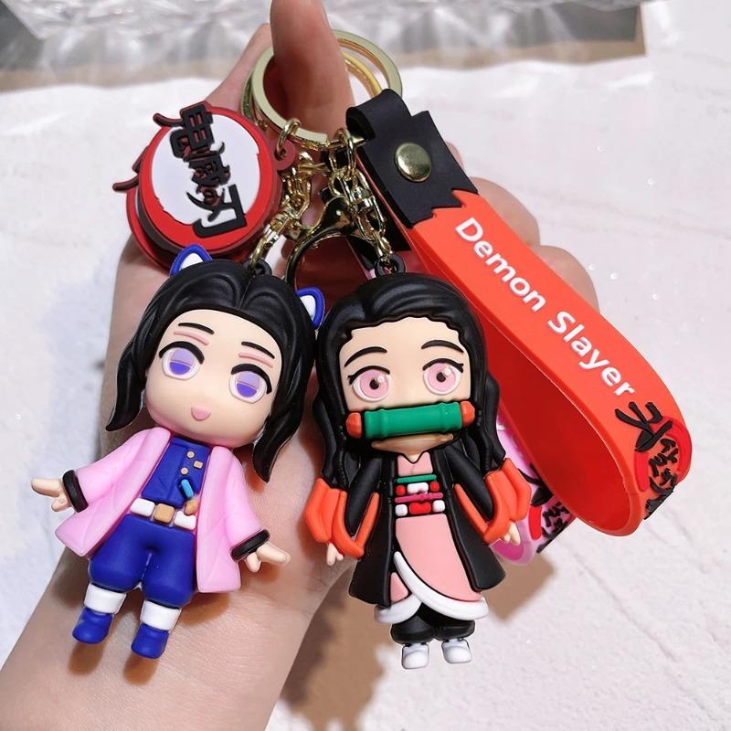 Demon Slayer keychains, anime doll car and motorcycle keychain accessories, cute character bag pendants, cartoon couple pendants