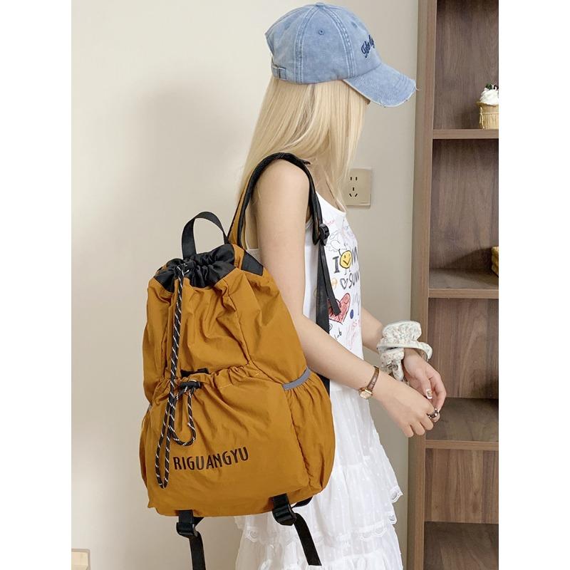 New schoolbag riding lightweight college student travel backpack men's and women's backpack drawstring mountaineering