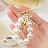 Metal Bow Pearl Keychain Phone Pendant Bag Pendant Phone Lanyard Accessories For Women Girls Sweet Decoration Gifts