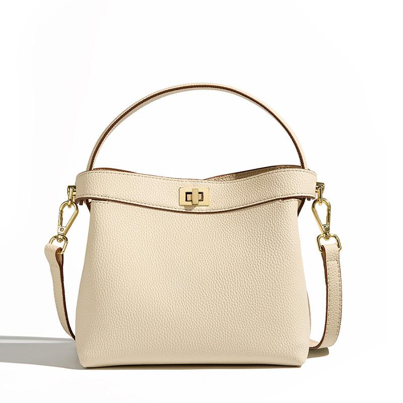 Niche design commuter handbag, high-end genuine leather crossbody bucket bag, single shoulder women's ins-style bucket bag