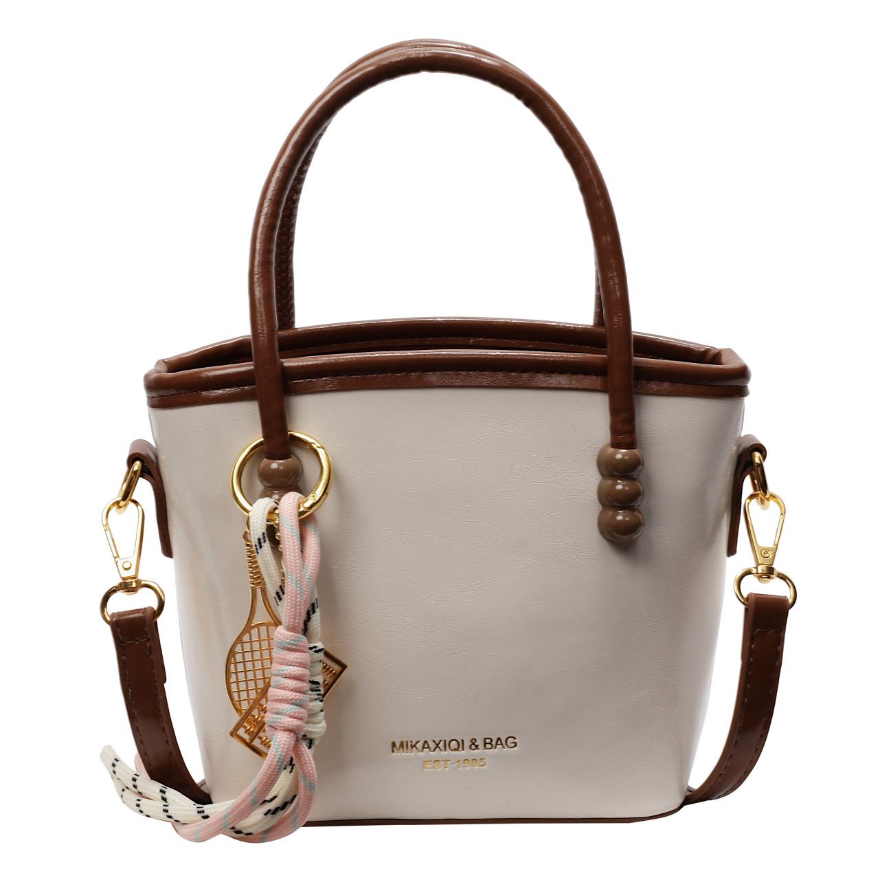 

High-end hand carrying bucket bag, fashionable and simple women s shoulder messenger bag, large-capacity commuter women s bag without pendant