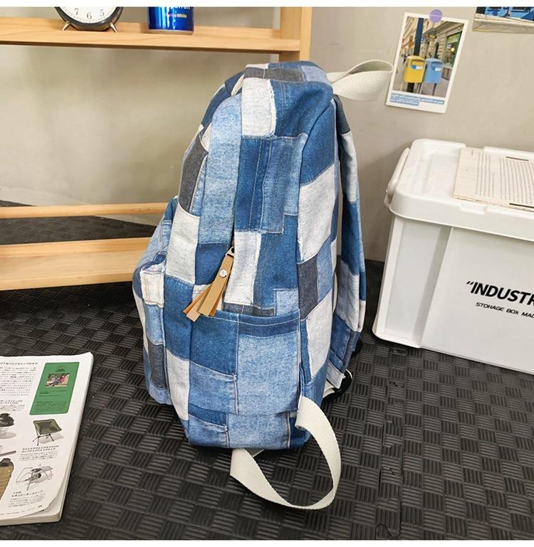 Large-capacity new middle school schoolbag, junior high school backpack, boys' casual versatile college student computer bag, women