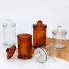 Brown Glass Candle Holder with Lid: Light-Blocking, Transparent Aromatherapy Cup.