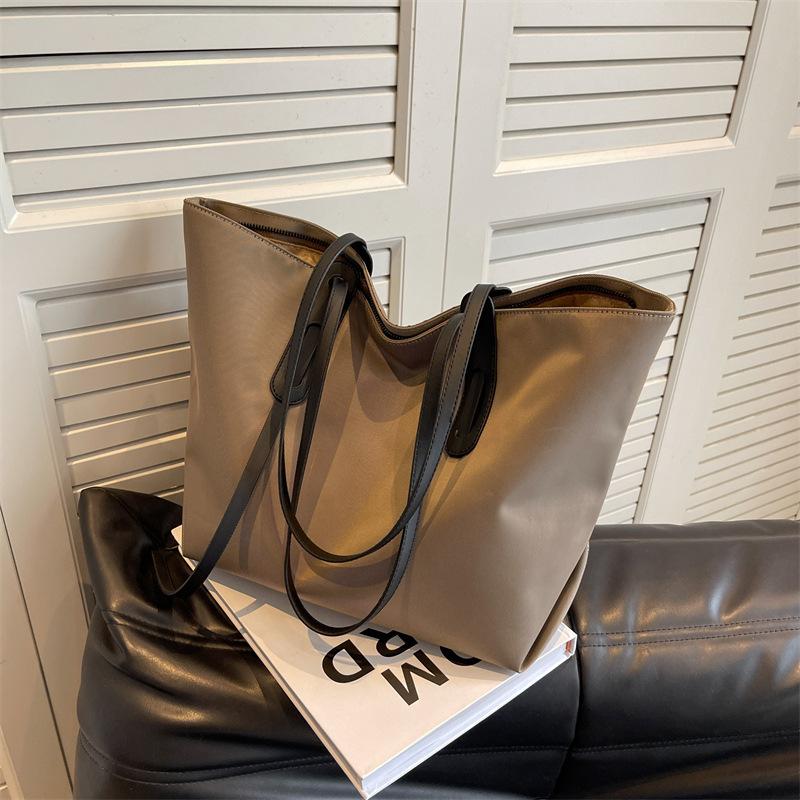 

Large capacity tote bag women s 2025 new Oxford cloth casual shoulder bag simple and versatile commuter handbag