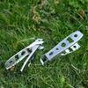 Outdoor Stainless Steel BBQ & Picnic Tool: Multifunctional Pot Clip, Bottle Opener, and Food Handle