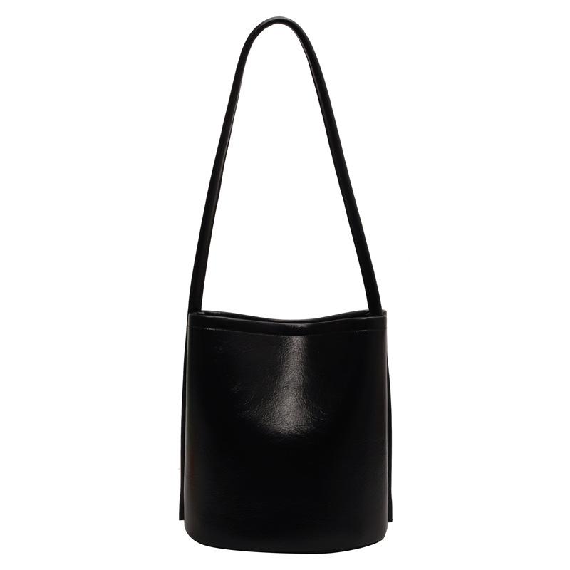 Sacs à bandoulière simples pour femmes de style coréen à la mode Été Nouveau Couleur unie simple Populaire Sac seau féminin