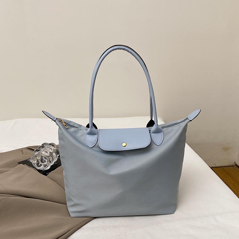 

Модная женская сумка из ткани 2025 года, новая большая сумка-тоут, модная сумка, простая повседневная универсальная сумка через плечо подмышкой