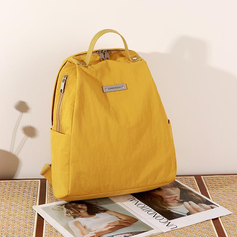 Lightweight Nylon Backpack with Side Zipper Pockets Top Handle Casual Daypack for Women Daily Commute Travel