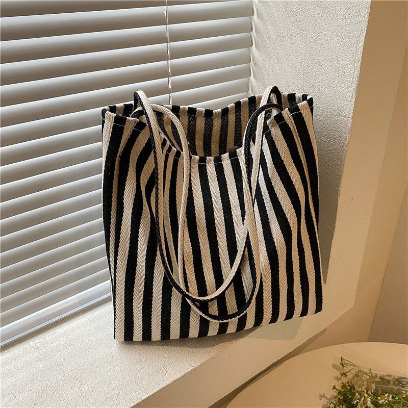 Textured large-capacity simple striped canvas bag women's 2025 new trendy fashion literature and art student class handbag