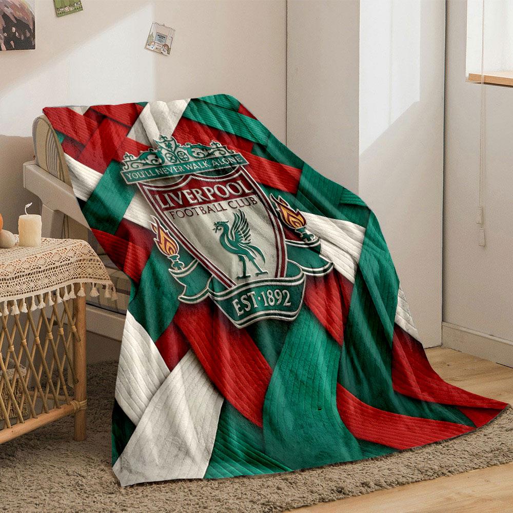 Woven red, green, and white textured pattern with a central crest. for all seasons blanket lunch break throw gift