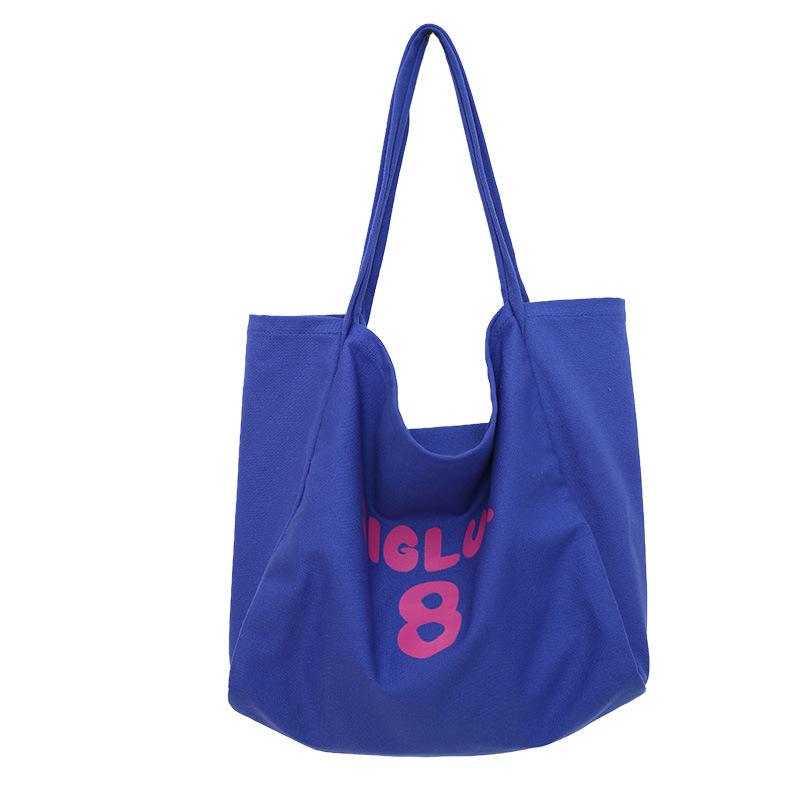 Spring and summer new printed canvas bag women's niche design large-capacity shoulder bag lazy atmosphere tote bag