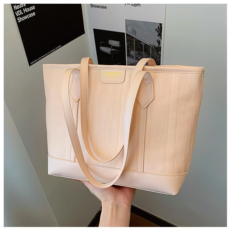 

Сумка великої місткості жіноча літня універсальна нова висококласна текстурована на плече сумка для покупок класна сумка-тоут для поїздок на роботу рожевий